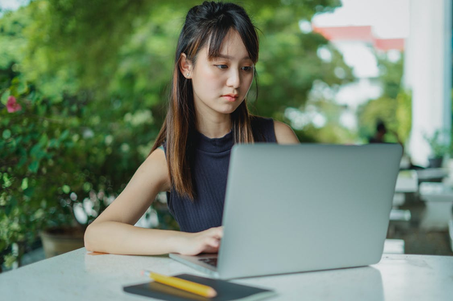 Woman looking at computer